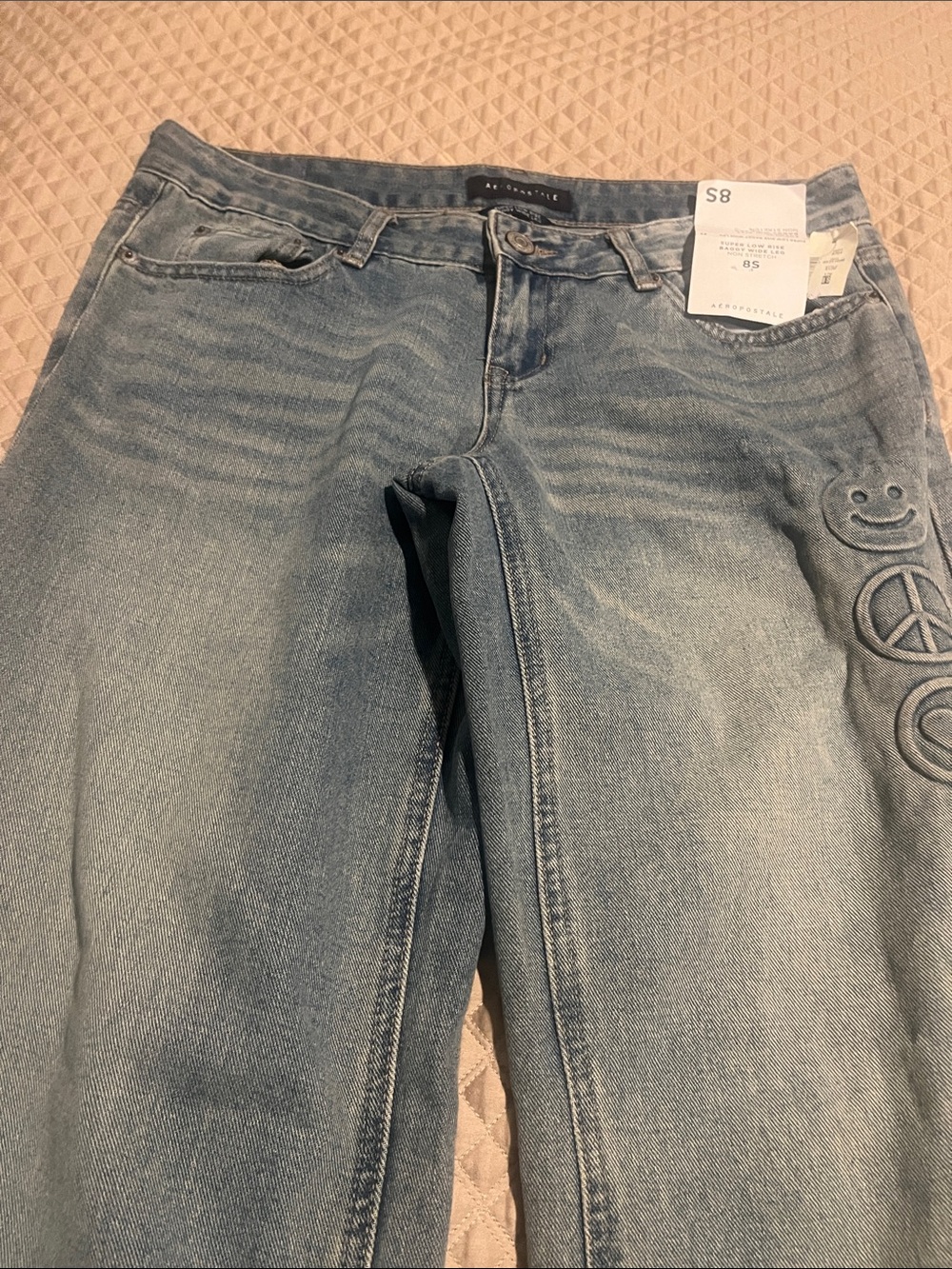 Aeropostale Light Blue Straight-Leg Jeans with Embroidered Smile & Peace Motifs